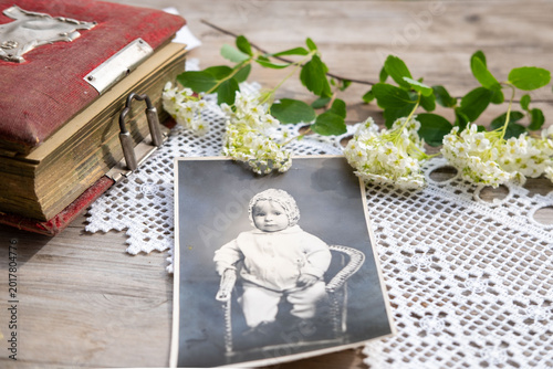 Canvas Print antique baby portrait photograph, vintage album, aged paper texture, flowers, wo
