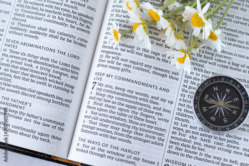 Photos Holy bible text for obedience to God Jesus Christ with compass and flowers