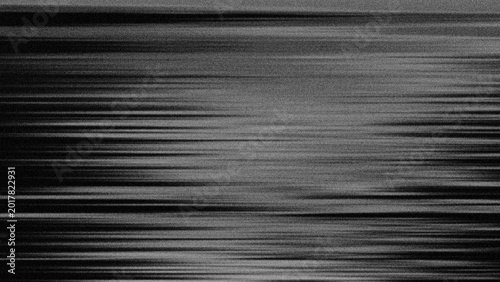 Valokuva Abstract lines move across dark grayscale surface
