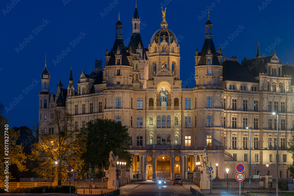 Fototapeta premium The Schwerin Castle at evening; at blue hour (twilight).