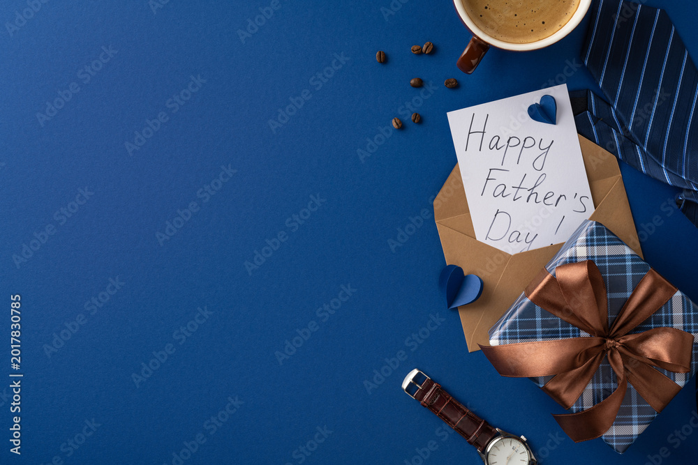 Fototapeta premium Happy Father's Day greeting with gift box, watch, tie and coffee on blue background