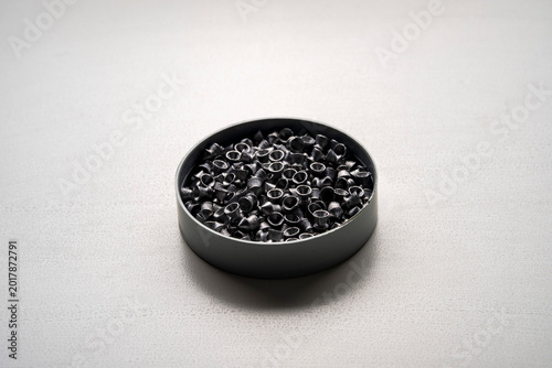 Airgun pellets on a white background.
