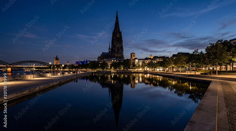 Fototapeta premium Towering Spire Silhouette With Reflective Pools for Minimal Architectural Landscape Wall Art Prints