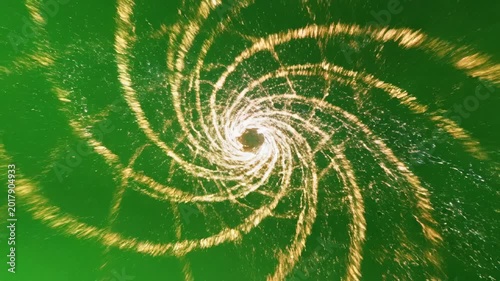 Formation of a rotating spiral galaxy with particles