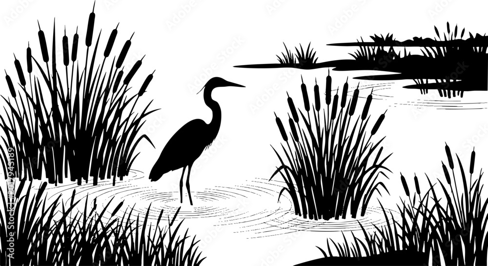 Obraz premium Heron silhouette in a marsh landscape with cattails and reeds