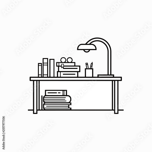 Desk with lamp and office supplies.