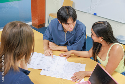 University Students Having Meeting in Lecture Hall