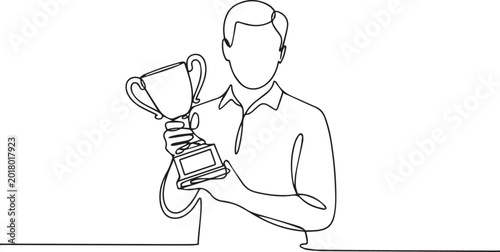 Canvas Print Man holding a trophy cup in a celebratory gesture of achievement and success