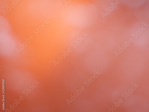 Una toma de cerca de un fondo abstracto de   color anaranjado brillante con un degradado ligero desenfocado