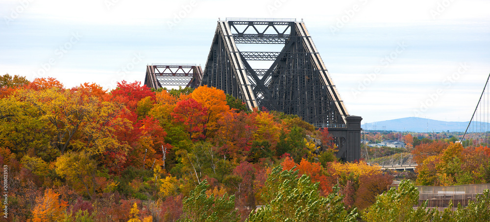 Fototapeta premium Quebec City's Old bridge seen above vibrant Autumn colours.