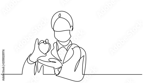 Foto Continuous line drawing of a female masked doctor holding a heart
