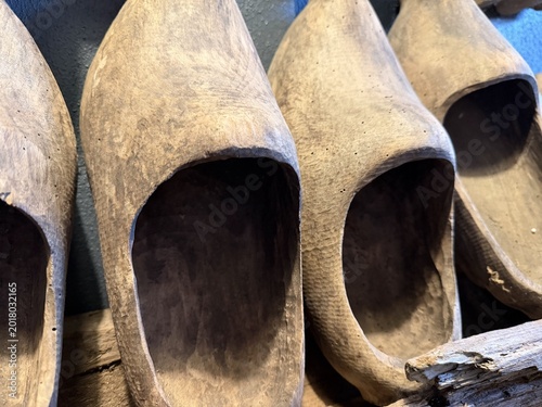 Wooden clogs displayed on a shelf - Sabots de bois exposés sur une étagère