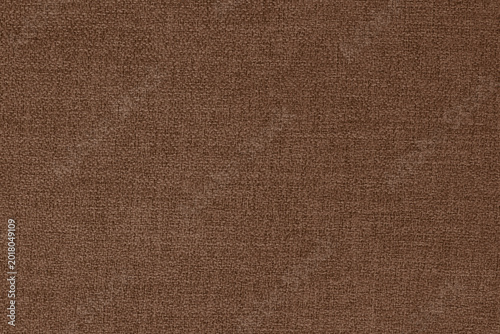 Dark brown linen fabric cloth texture for background, natural textile pattern.