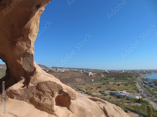 Bild auf Leinwand rock cave with a sea view in Calavera hill (Cerro de La Calavera) in La Paz, Mex
