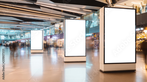 Vertical digital billboard shopping mall blank screen modern interior advertising display empty advertisement bright lighting urban space motion