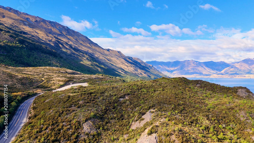 Photos Aerial View of Winding Mountain Road by Lake Wakatipu in Queenstown
