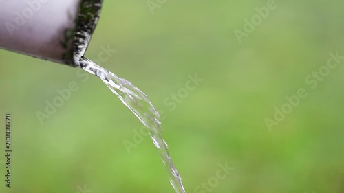 water flows out of the drainpipe