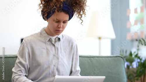 Female businessman working with smart phone and laptop and digital tablet computer.