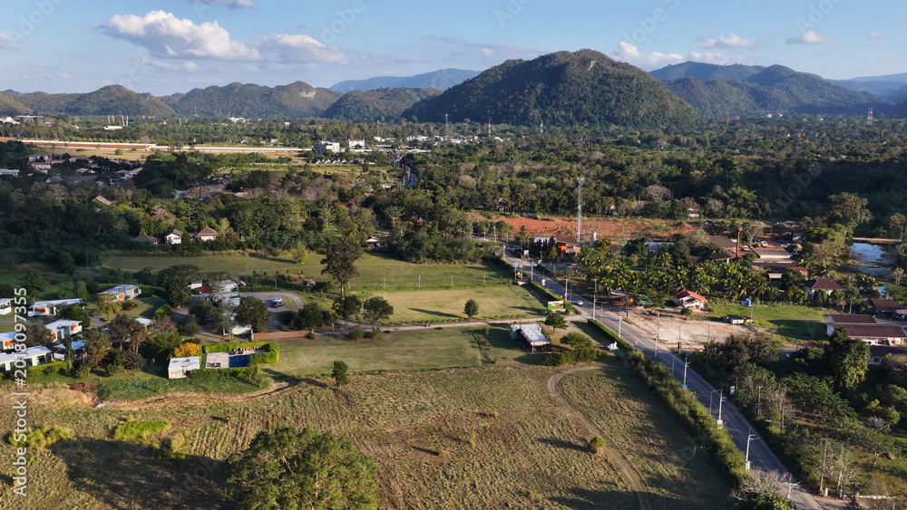 Obraz premium Aerial View of Khao Yai Landscape with Fields and Mountains