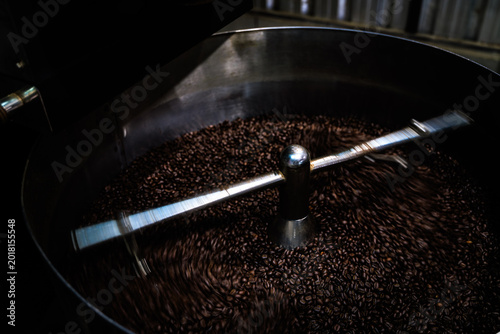 Konstfotografi Industrial Coffee Bean Agitator Mixing Dark Roasted Beans In A Metal Cooling Tra