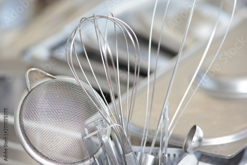 Billede på lærred Professional Stainless Steel Kitchen Utensils and Equipment in Restaurant Sculle