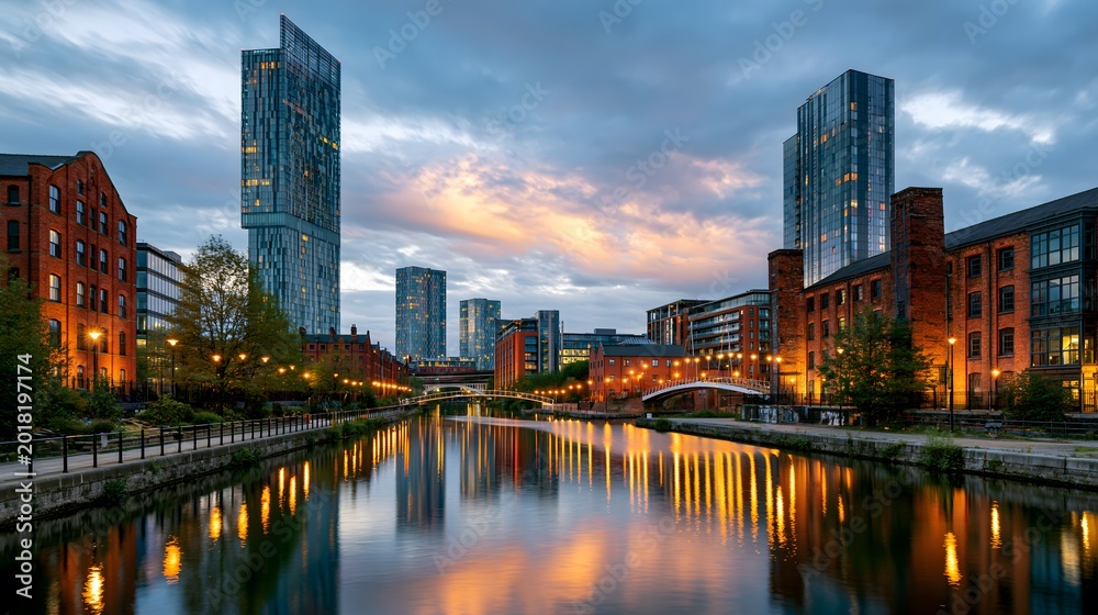 Obraz premium Manchester's Industrial Evolution: A Balanced Cinematic View of Castlefield Canal, Blending Historic Red-Brick Warehouses with Sleek Modern Glass Skyscrapers at Twilight