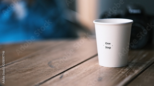 Fotografie cup of coffee on wooden table