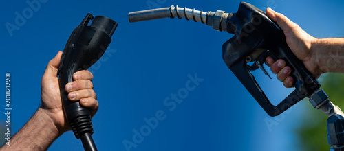 Bild auf Leinwand Fuel choice compares gasoline and electric