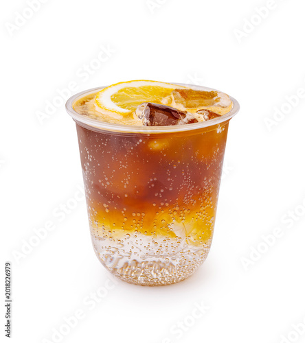 Espresso tonic coffee with ice and lemon slice