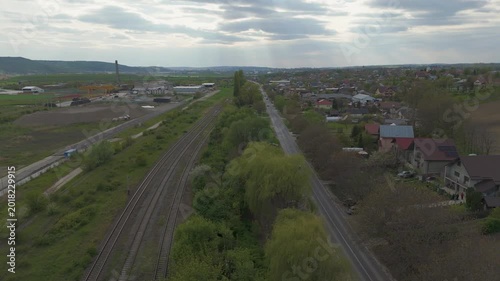 Aerial View of Railway and Rural Road with Cars in Romanian Countryside