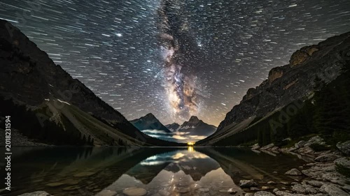 Stunning time-lapse of the Milky Way galaxy over a mountain lake, creating a breathtaking celestial reflection