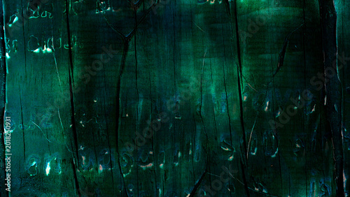 Deep teal weathered wood texture with vertical grain and cracks