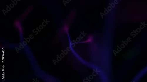 A high-angle macro view of multiple blue electric streams rising vertically, representing high-energy particle ionization inside a physics laboratory glass.