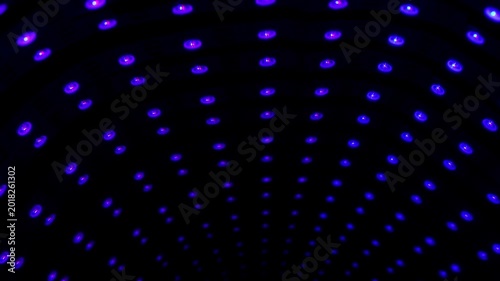 Out-of-focus blue led dots creating a shimmering bokeh effect.