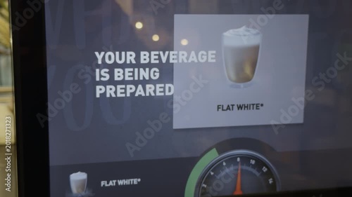 Coffee prep display. Modern self service station with digital menu and progress indicator for coffee