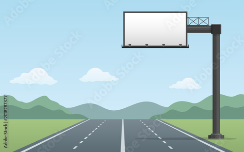 Billboard mounted blank over highway roadside landscape