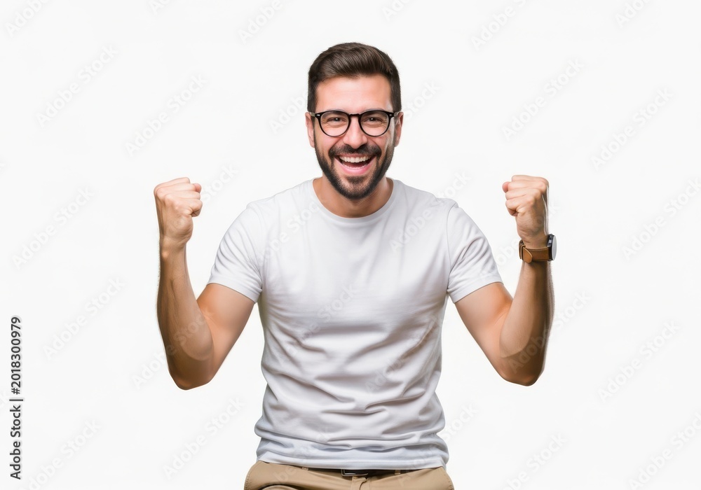 Fototapeta premium Excited bearded man with glasses celebrating success isolated on white background