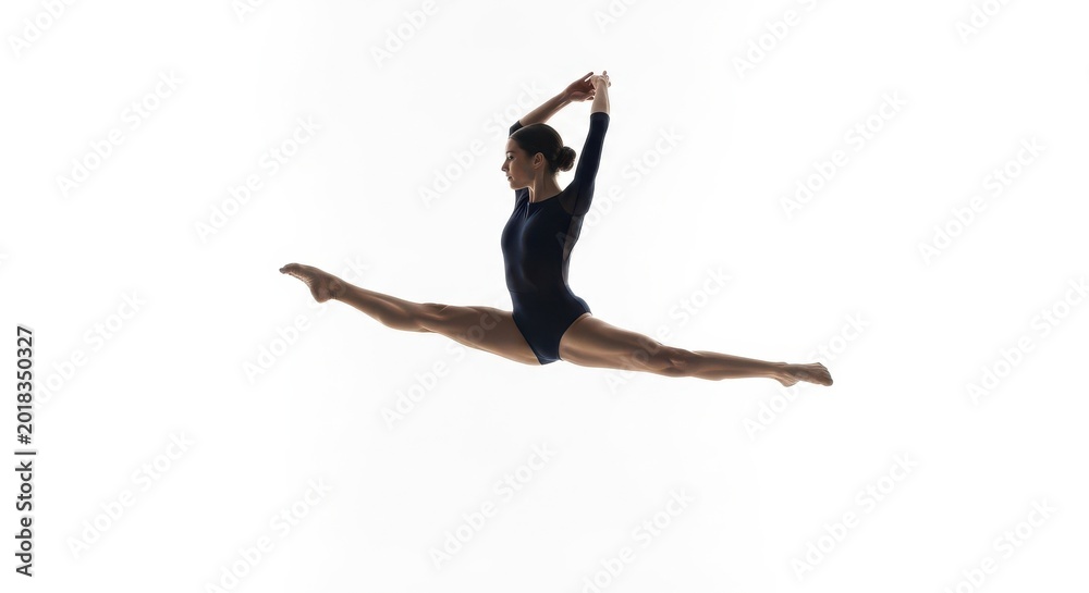 Obraz premium Female Gymnast Performing a Split Jump Against a White Background