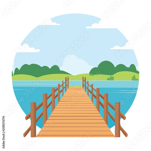 Wooden pier extends over water toward green hills under a blue sky