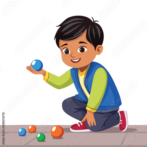 Young boy playing with colorful spheres on a pavement surface