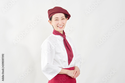 笑顔のパティシエ女性のポートレート