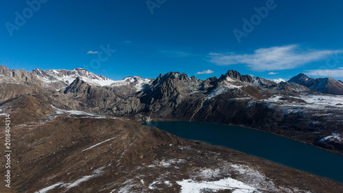 Frozen Sister Lakes in Tibet During Winter, Scenic Alpine Landscape in Western China