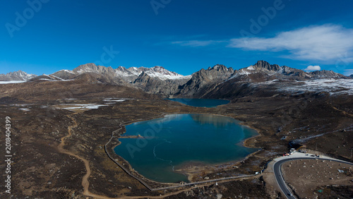 Frozen Sister Lakes in Tibet During Winter, Scenic Alpine Landscape in Western China