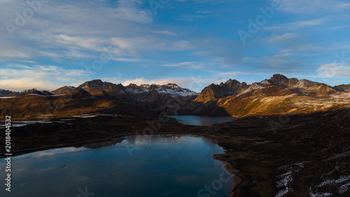 Frozen Sister Lakes in Tibet During Winter, Scenic Alpine Landscape in Western China