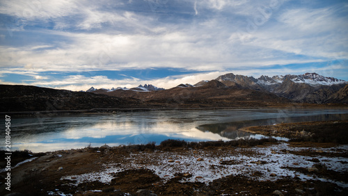 Frozen Sister Lakes in Tibet During Winter, Scenic Alpine Landscape in Western China