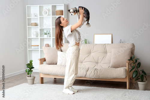 Young woman holding her Bie...