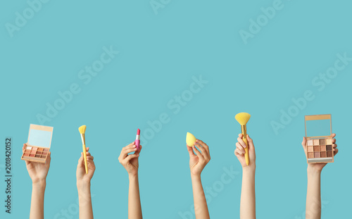 Female hands with makeup br...