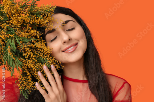 Beautiful young woman with ...
