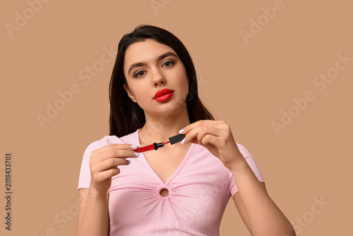 Beautiful young woman with ...