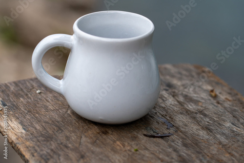 White Ceramic Mug on Rustic Wooden Table Minimal Cozy Coffee Cup Close Up